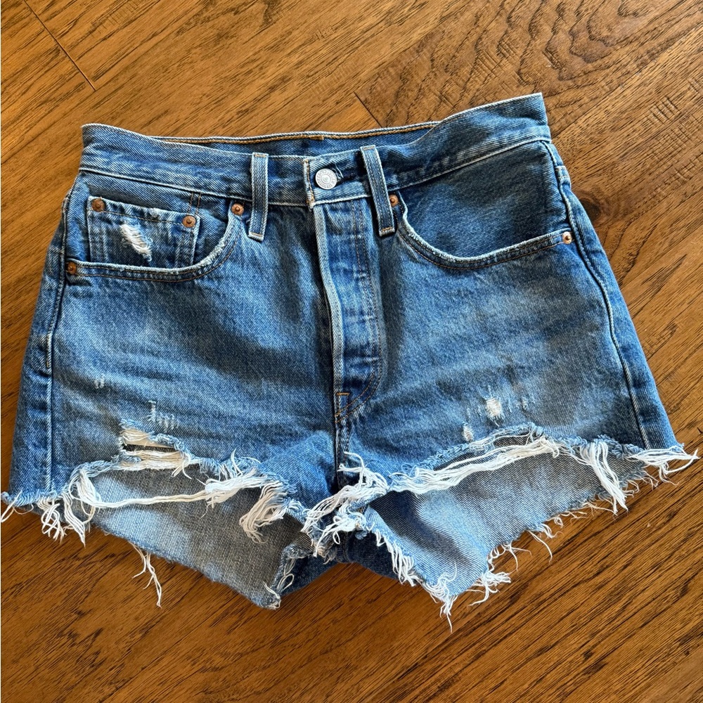 Levi’s 501 Distressed Blue Denim Shorts from Anthro